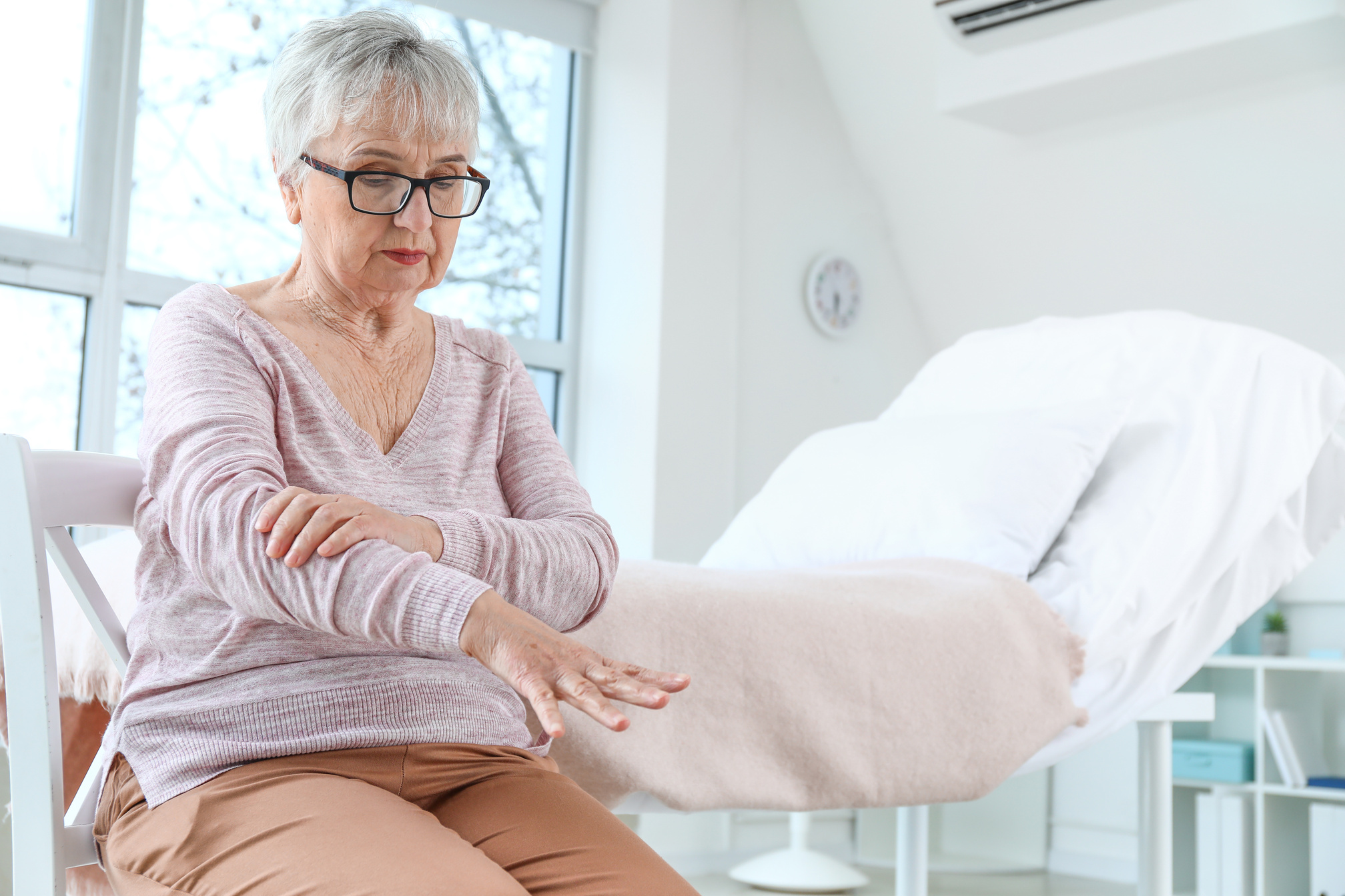 Elderly Woman Suffering from Parkinson Syndrome